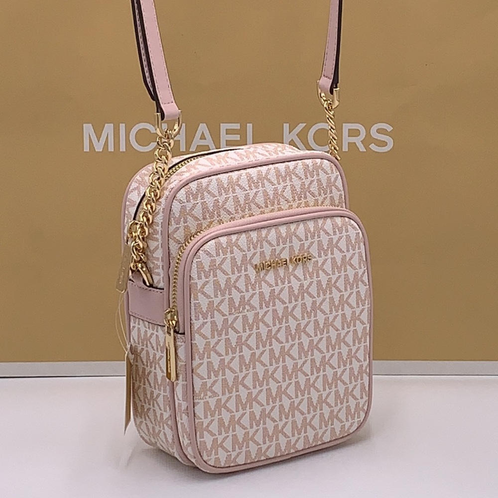 MICHAEL KORS
Jet Set Travel Md Signature Logo Crossbody
OPTIC WHITE/RS GOLD
NWT - Picture 2 of 16